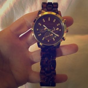Michael Kors tortoise watch.